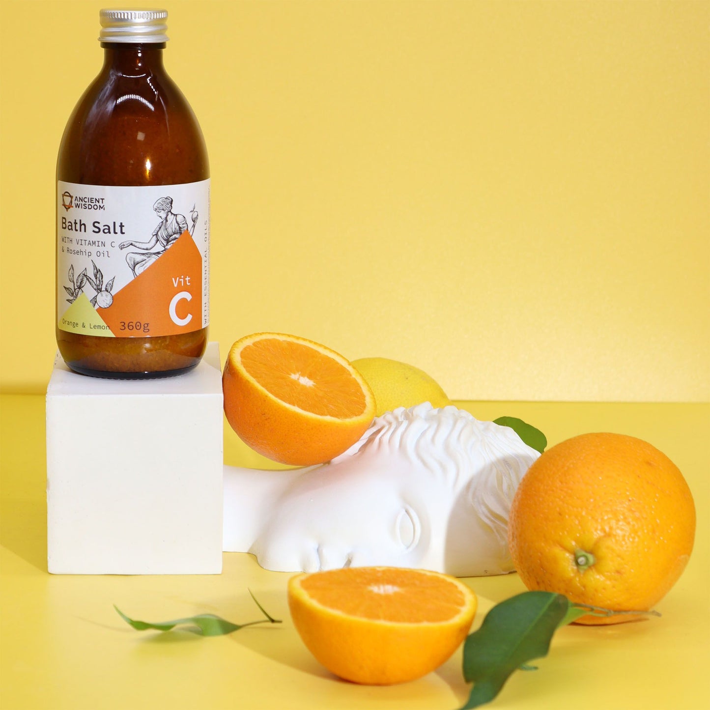Barattolo di sali da bagno alla Vitamina C con frutti di arancia e limone - Pleyas